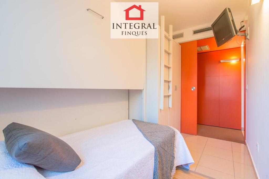 Posteľ alebo postele v izbe v ubytovaní Palamós BeachFront Apartment