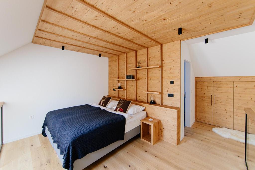 Postel nebo postele na pokoji v ubytování Apartmaji štAla