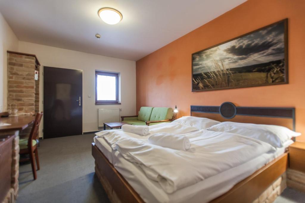 Postel nebo postele na pokoji v ubytování Hotel Vinař - Bed & Breakfast