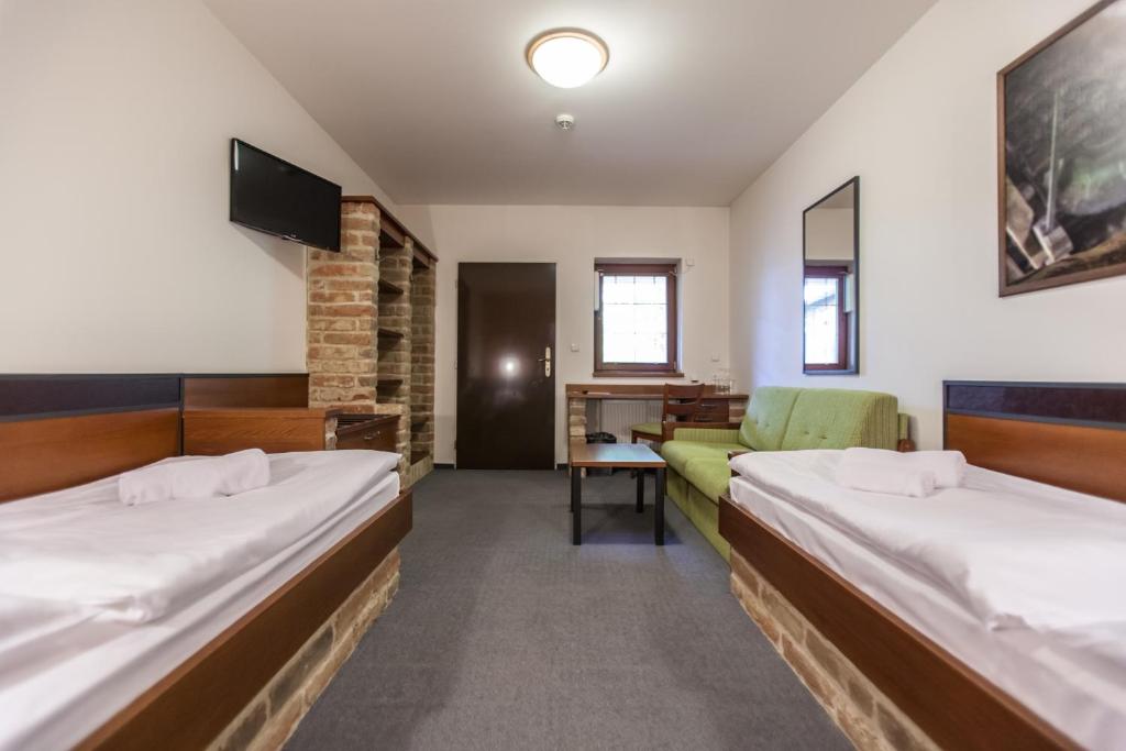 Postel nebo postele na pokoji v ubytování Hotel Vinař - Bed & Breakfast