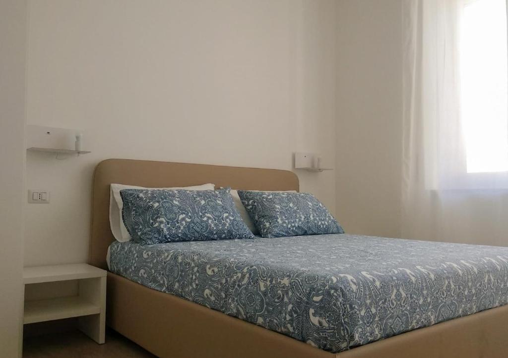 Posteľ alebo postele v izbe v ubytovaní Le Tre Casuzze