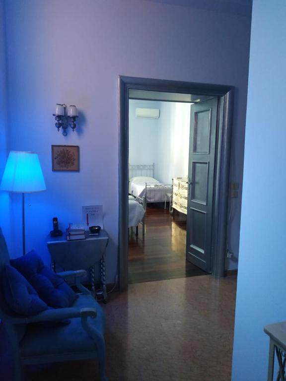 A bed or beds in a room at Around The Corner Colosseo B&B