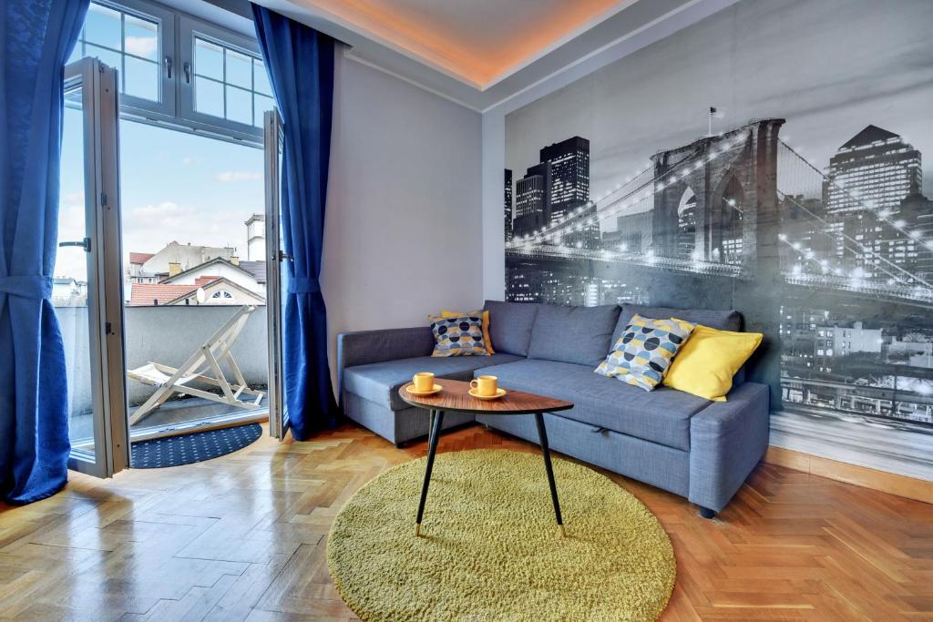 Posedenie v ubytovaní Grand Apartments