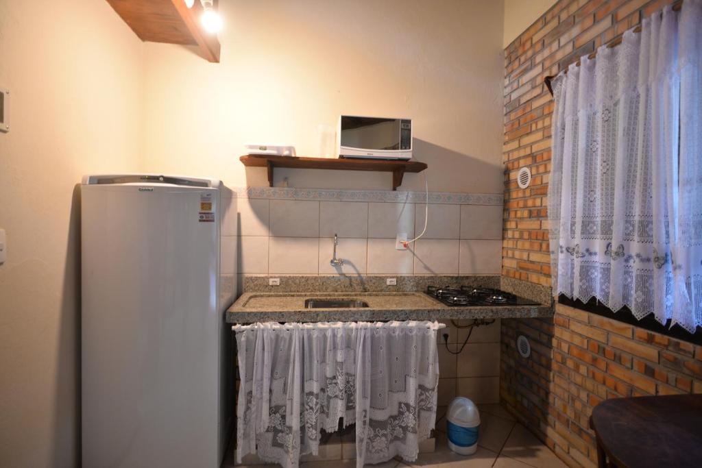 A cozinha ou cozinha compacta de Pousada Sítio Olho D'Água