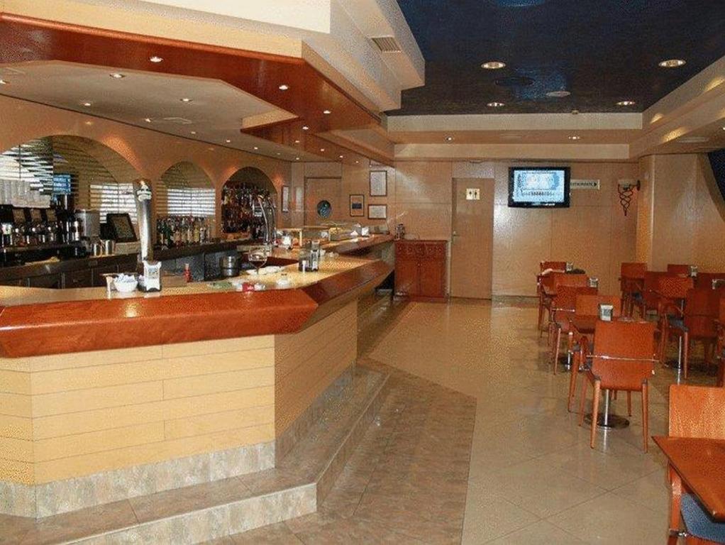 Reštaurácia alebo iné gastronomické zariadenie v ubytovaní Hotel Ébora by Vivere Stays