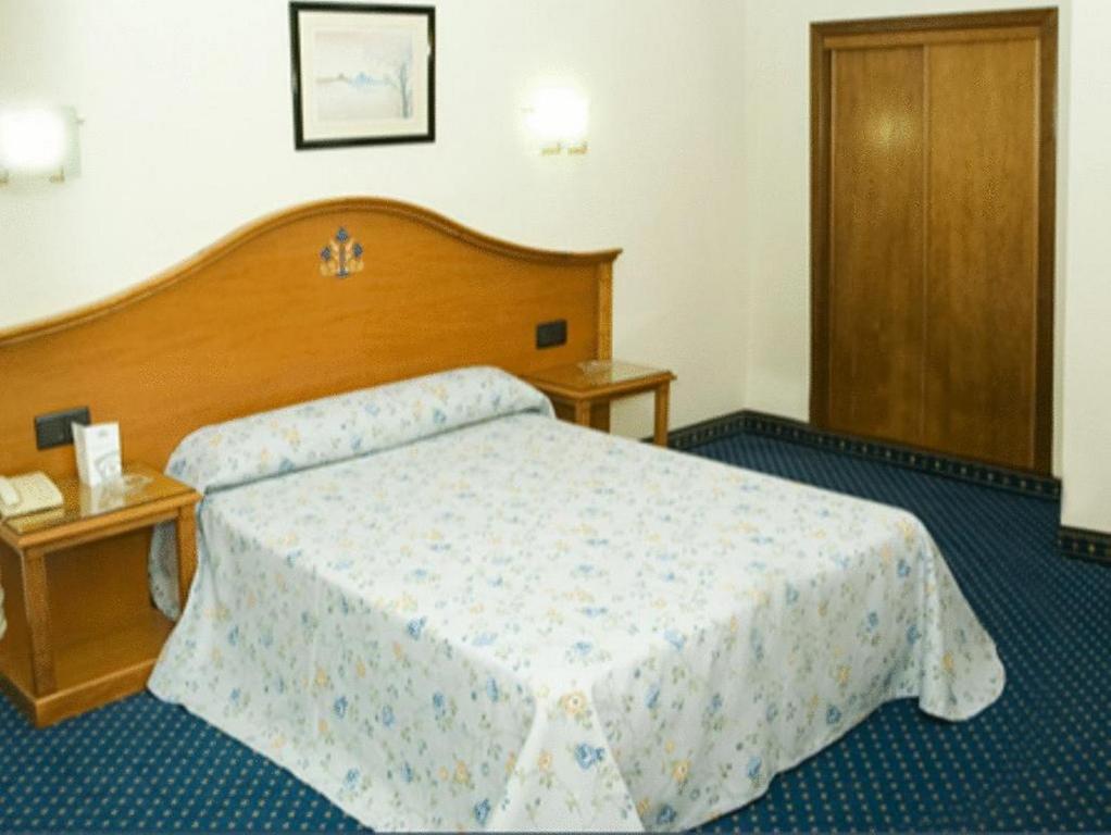 Posteľ alebo postele v izbe v ubytovaní Hotel Ébora by Vivere Stays