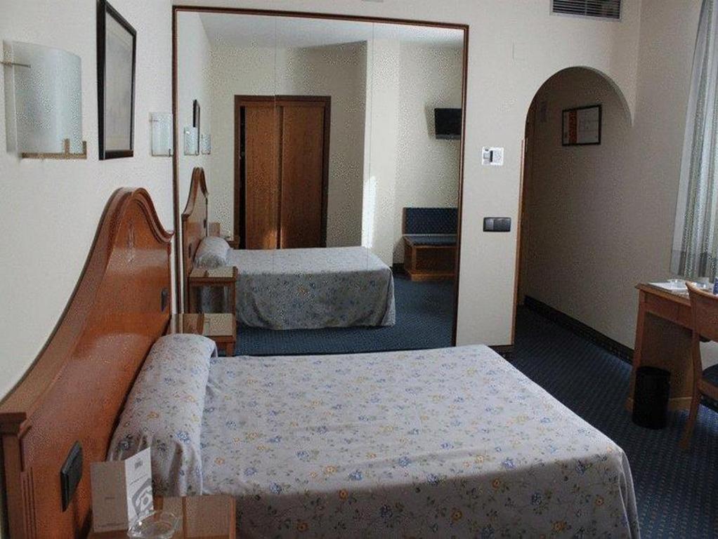 Posteľ alebo postele v izbe v ubytovaní Hotel Ébora by Vivere Stays