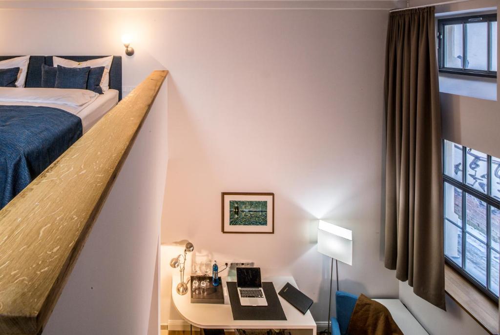 Postel nebo postele na pokoji v ubytování Hotel Oderberger