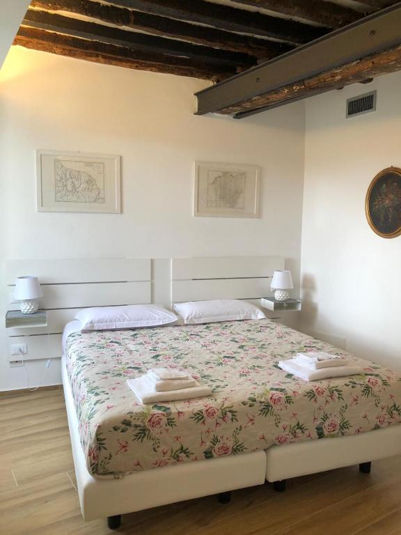 Postel nebo postele na pokoji v ubytování Agriturismo SanCristoforo