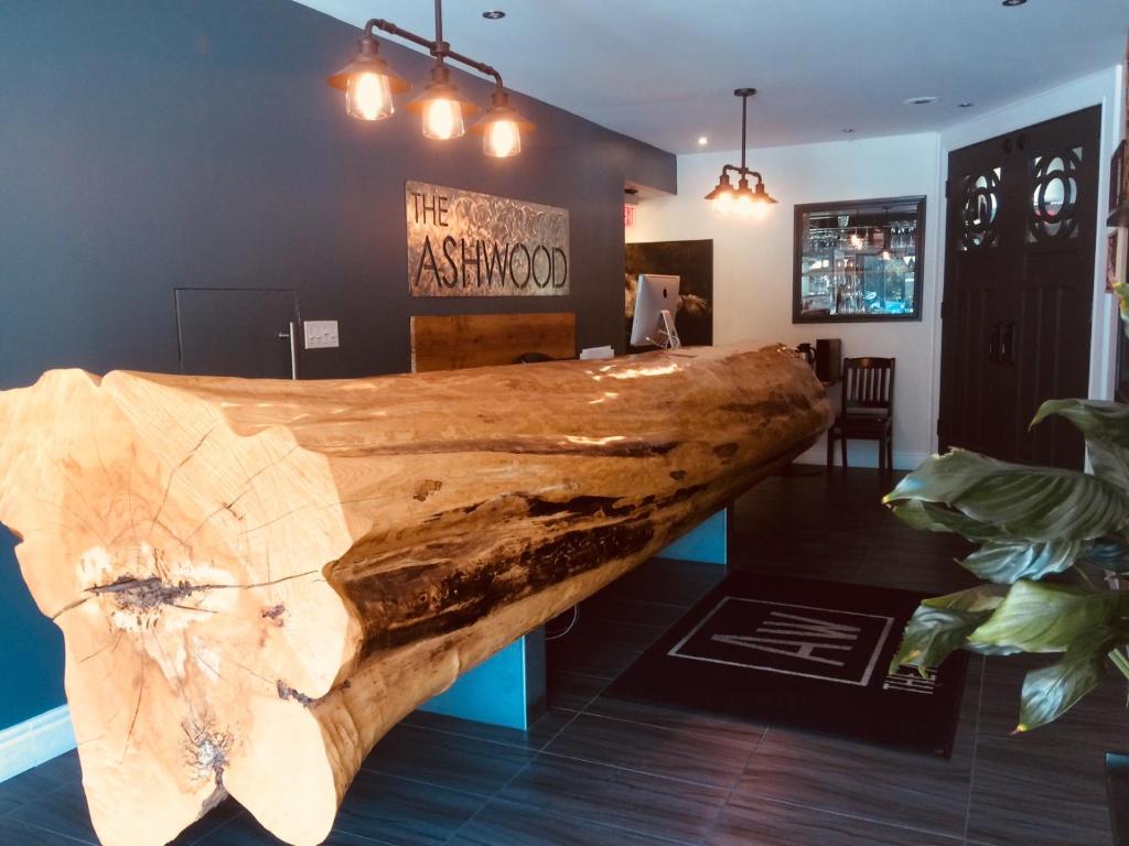 a large piece of drift wood in a room at THE ASHWOOD INN in Bayfield