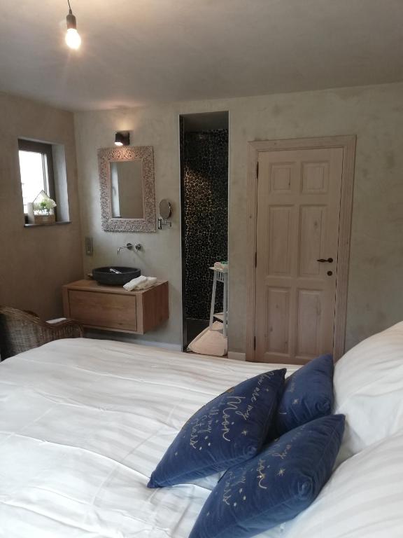 Postel nebo postele na pokoji v ubytování Wellness Sweet Bonihu B&B