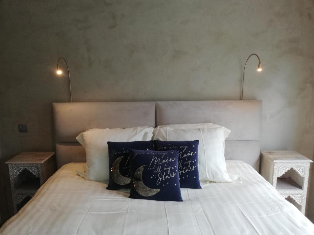 Postel nebo postele na pokoji v ubytování Wellness Sweet Bonihu B&B