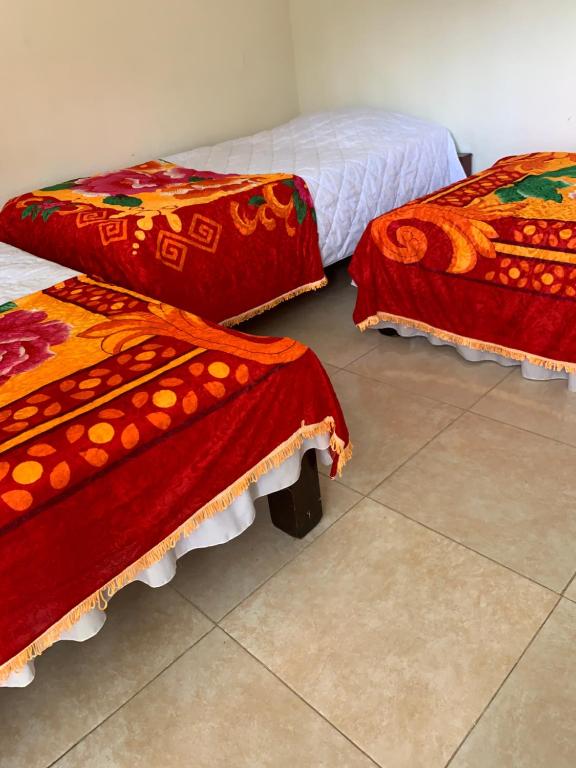 Postel nebo postele na pokoji v ubytování Hotel Maxim