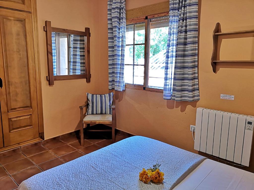 Posteľ alebo postele v izbe v ubytovaní Casa Laguna del Maiz cazorla