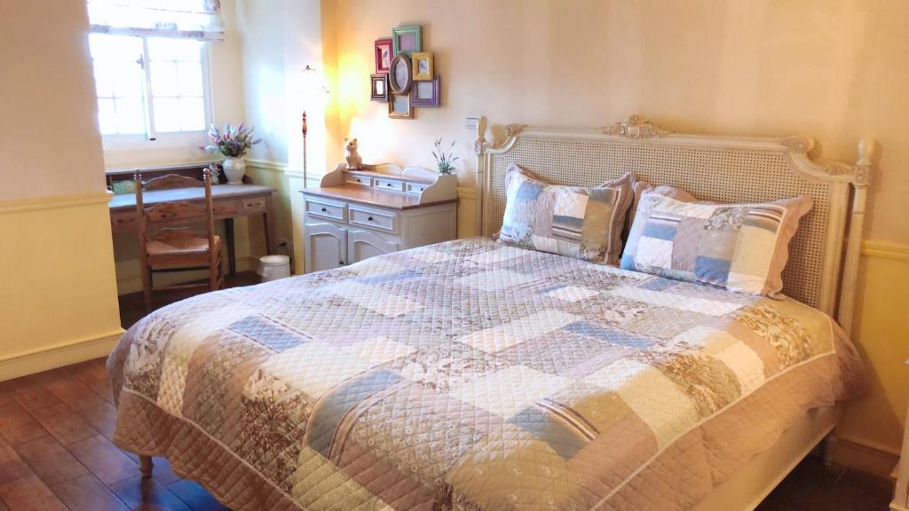 Postel nebo postele na pokoji v ubytování Fazhana Village B&B
