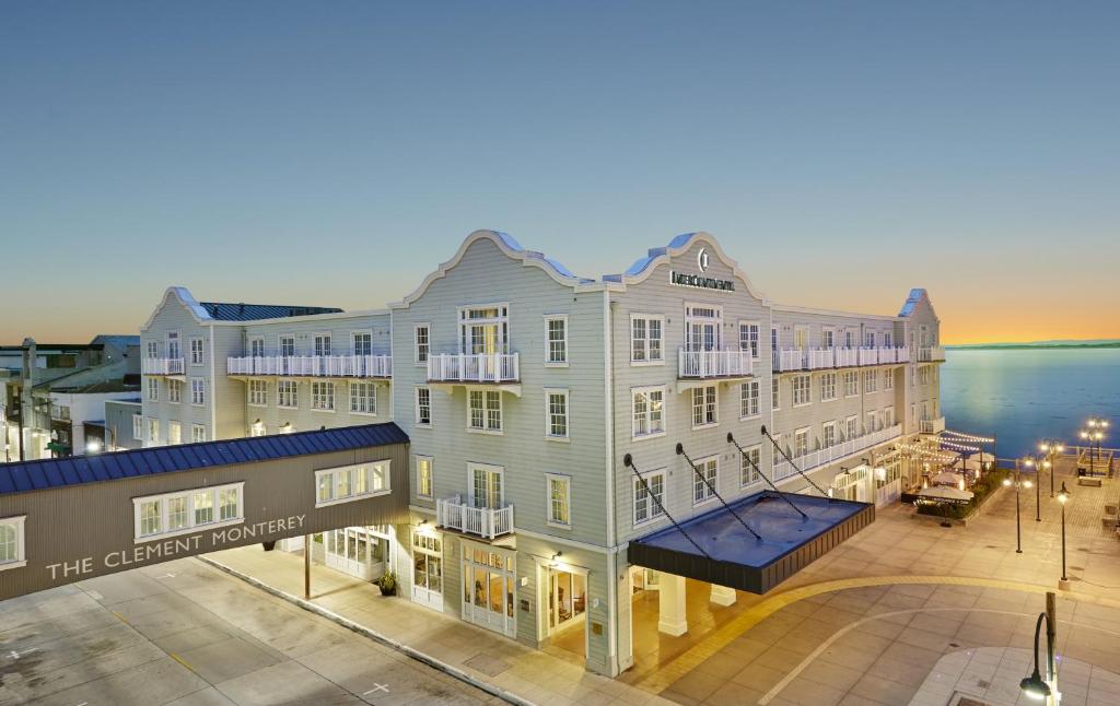 an aerial view of a building with the ocean in the background at InterContinental The Clement Monterey, an IHG Hotel in Monterey
