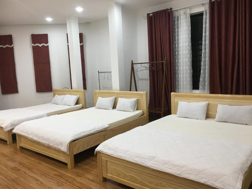 Postel nebo postele na pokoji v ubytování Ken King 2 - homestay gần biển giá rẻ