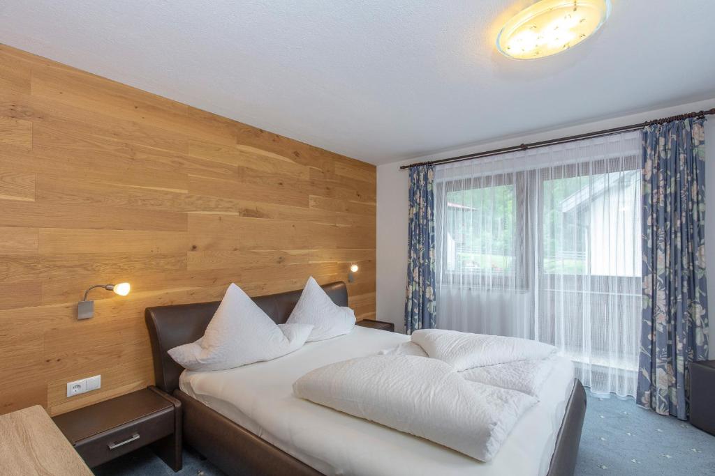 Postel nebo postele na pokoji v ubytování Appartement Rosengarten