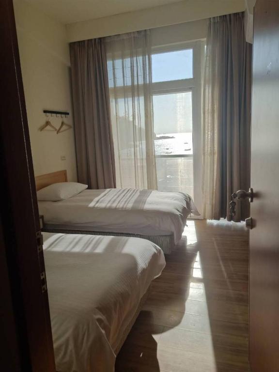 馬港驛站 Oldharbor Hostel房間的床