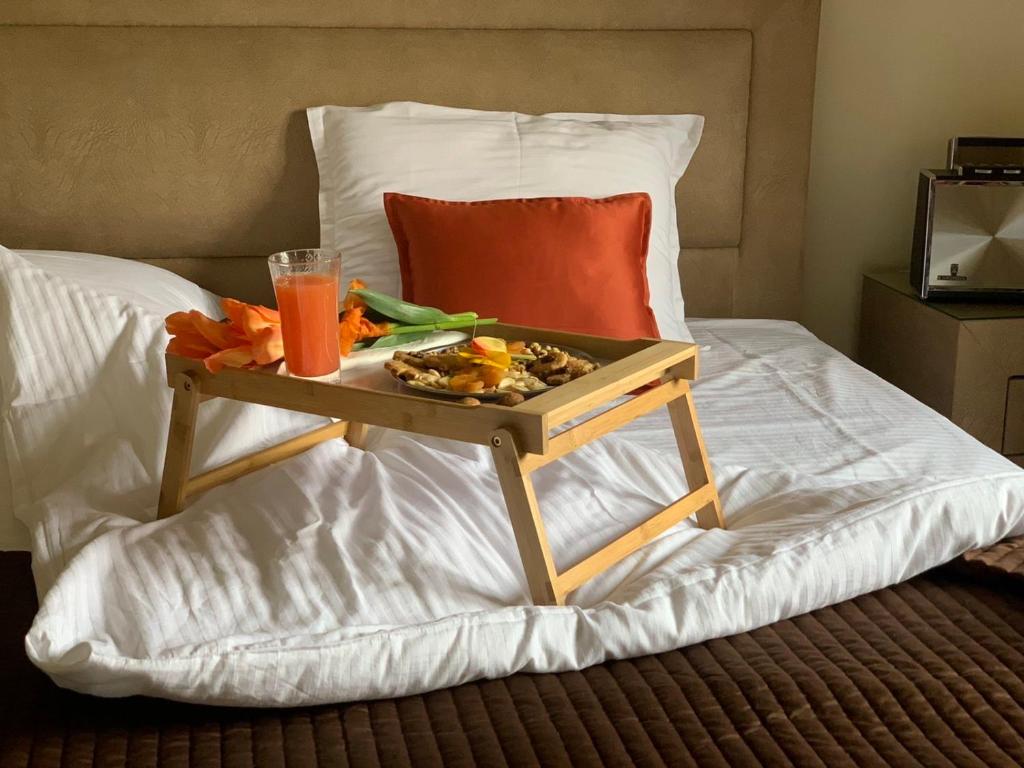 Postel nebo postele na pokoji v ubytování Zvjezdana dolina Garni hotel