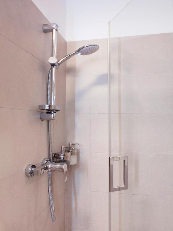 A bathroom at Central Point by Zoom Apartments