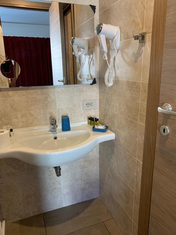 Koupelna v ubytování Hotel Stradivari