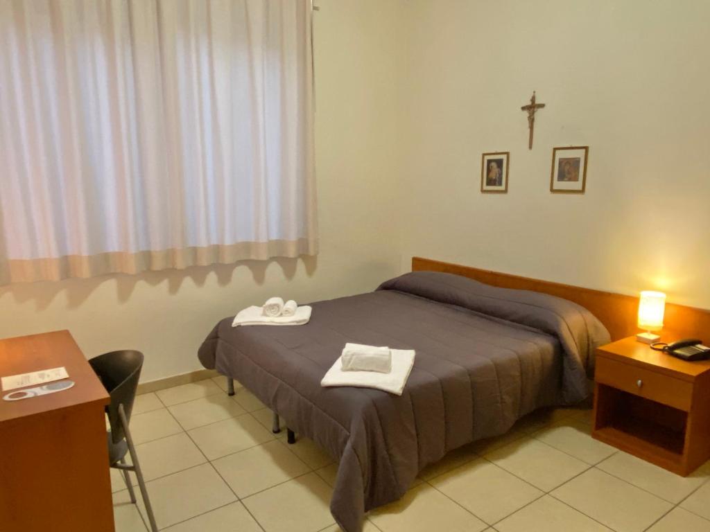 Letto o letti in una camera di Casa per Ferie Sant'Anna