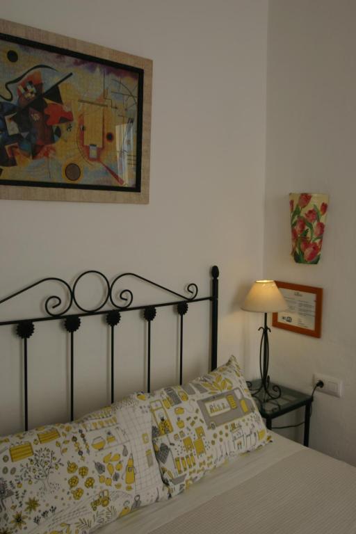 Cama o camas de una habitación en Pension el Portillo