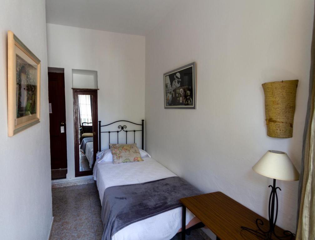 Cama o camas de una habitación en Pension el Portillo