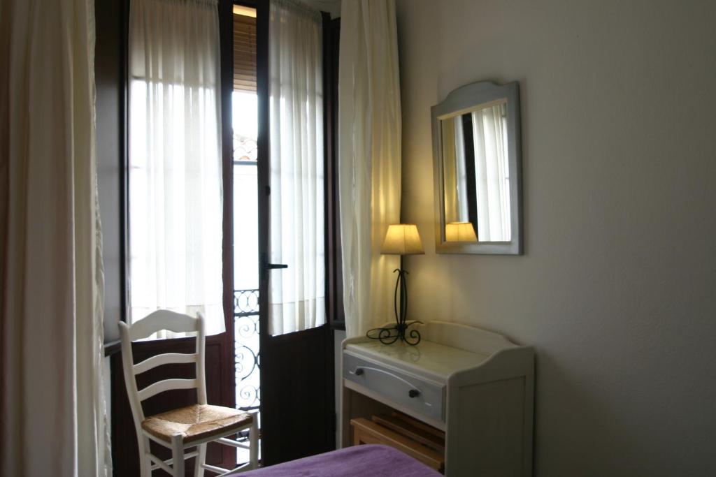 Cama o camas de una habitación en Pension el Portillo