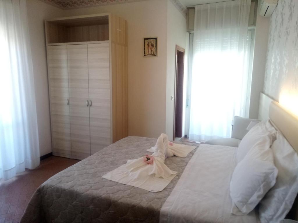 Postel nebo postele na pokoji v ubytování Hotel Welt