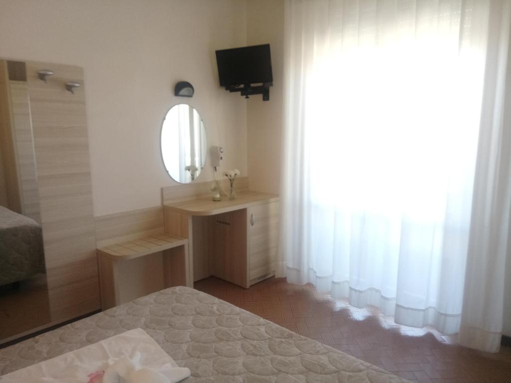 Postel nebo postele na pokoji v ubytování Hotel Welt