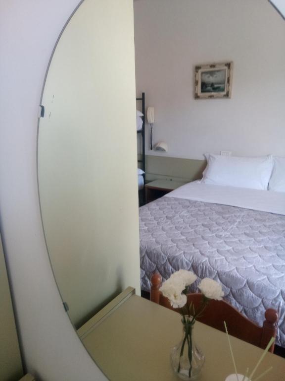 Postel nebo postele na pokoji v ubytování Hotel Welt