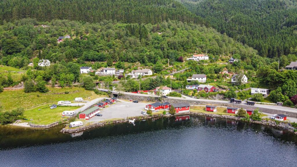 an aerial view of a parking lot next to a lake at Grimen Camping in Bergen