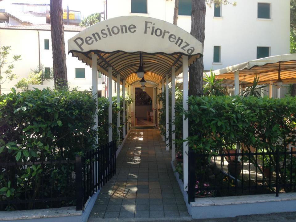 a entrance to a building with a sign that reads performance forensics at Hotel Fiorenza in Milano Marittima