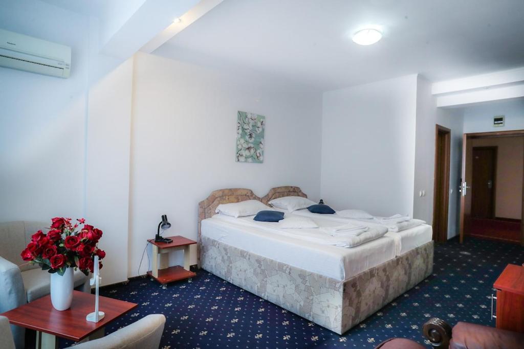 Uma cama ou camas num quarto em Hotel Pami