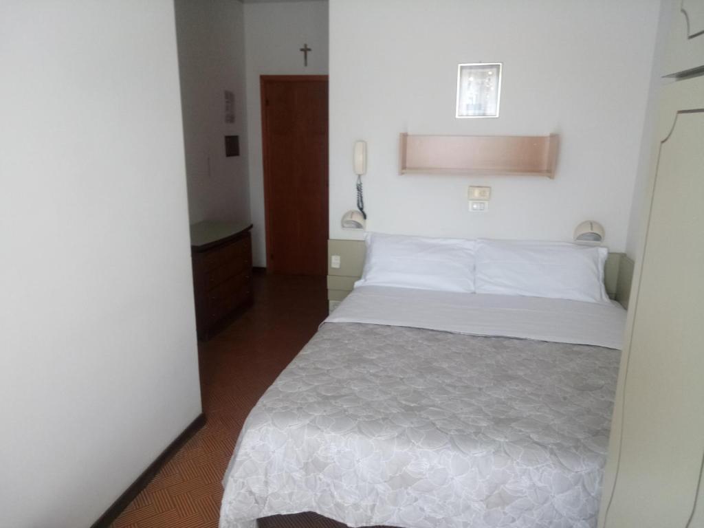Postel nebo postele na pokoji v ubytování Hotel Welt