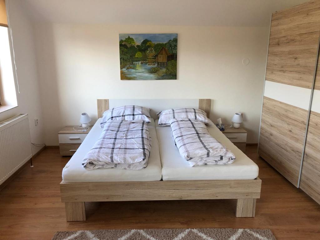 Postel nebo postele na pokoji v ubytování Aqua