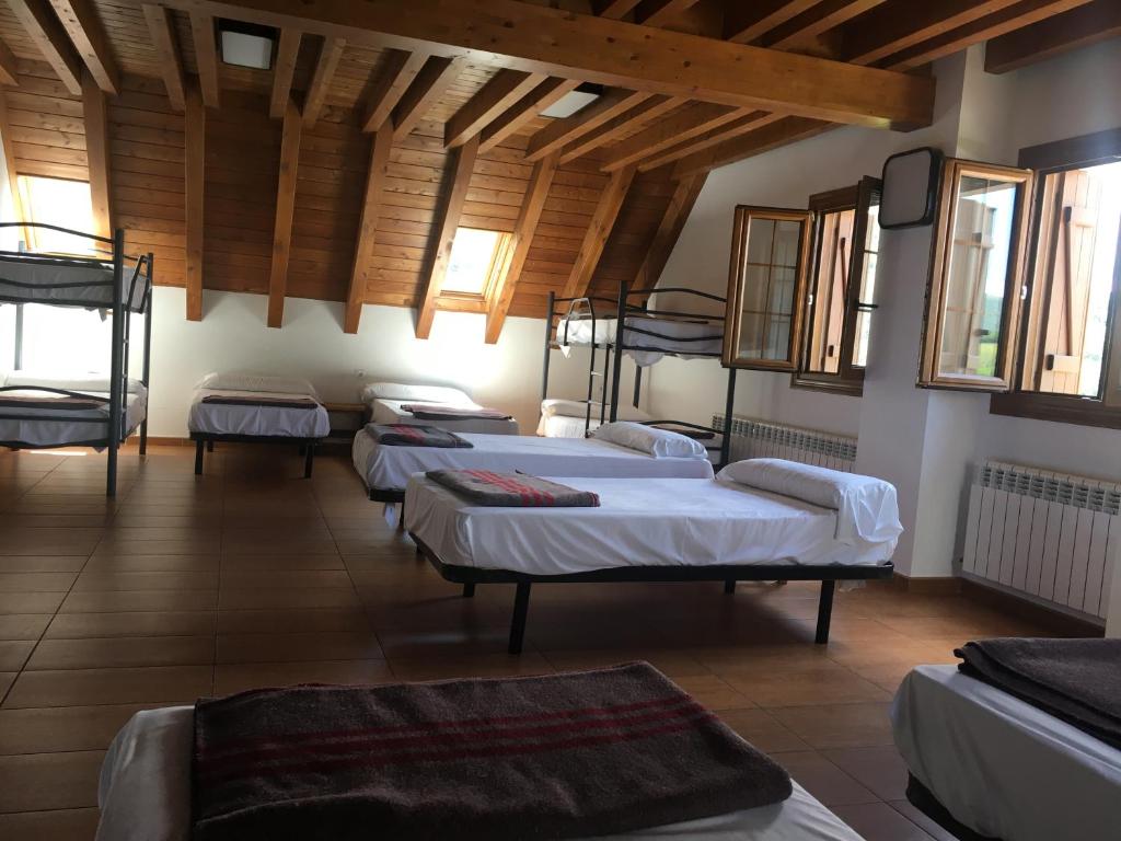 Postel nebo postele na pokoji v ubytování Hostal Rural Haizea