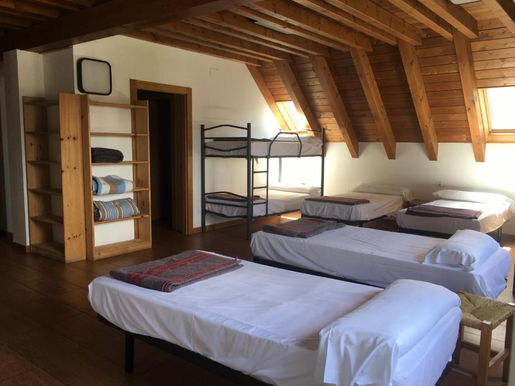Postel nebo postele na pokoji v ubytování Hostal Rural Haizea