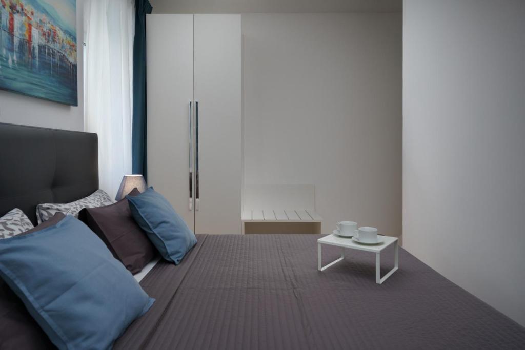 Łóżko lub łóżka w pokoju w obiekcie Apartments Antons 2