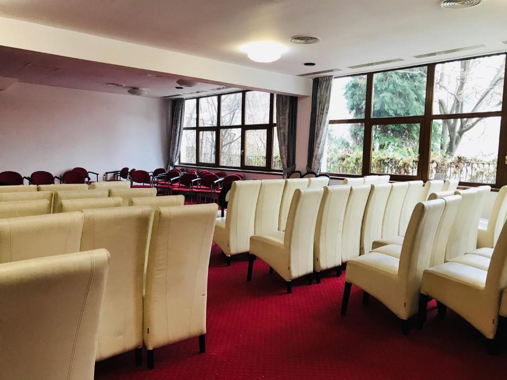 Uma área de estar em Hotel Pami