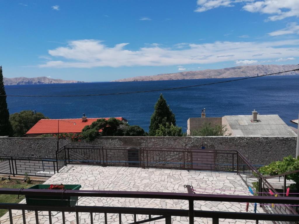 a view of the water from a house at Apartmani Krijesnica in Senj