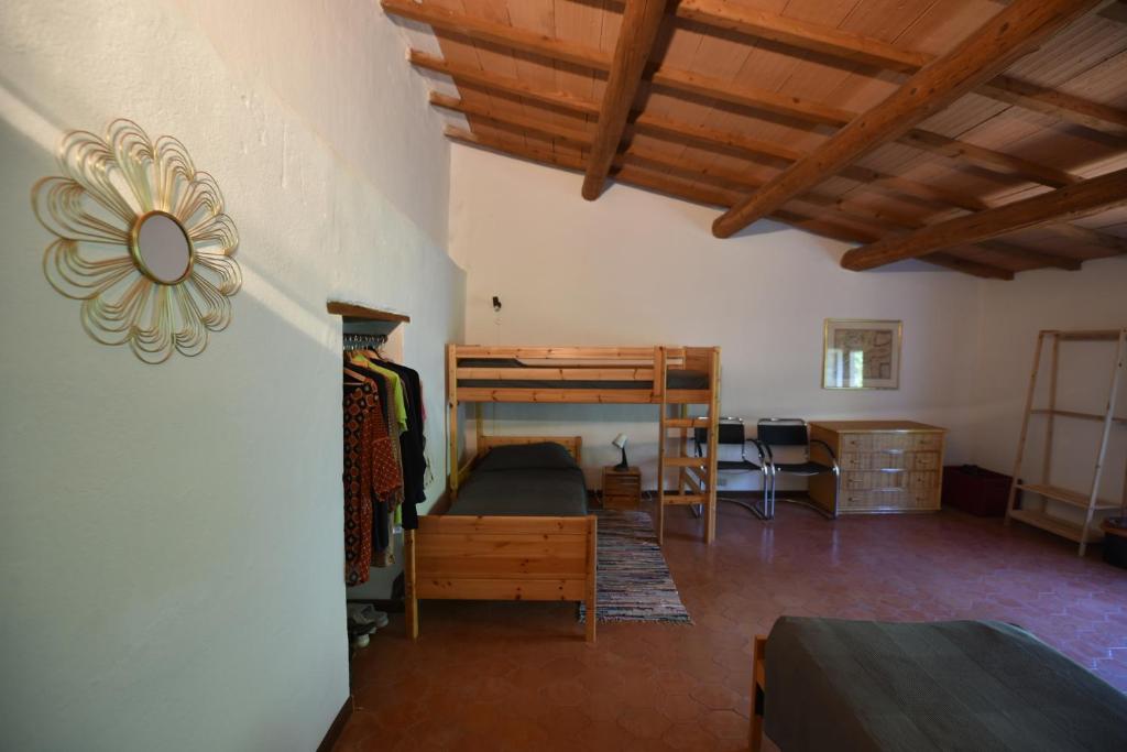 A bed or beds in a room at CASE&COLLINE La Prospettiva