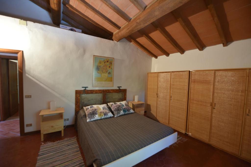 A bed or beds in a room at CASE&COLLINE La Prospettiva