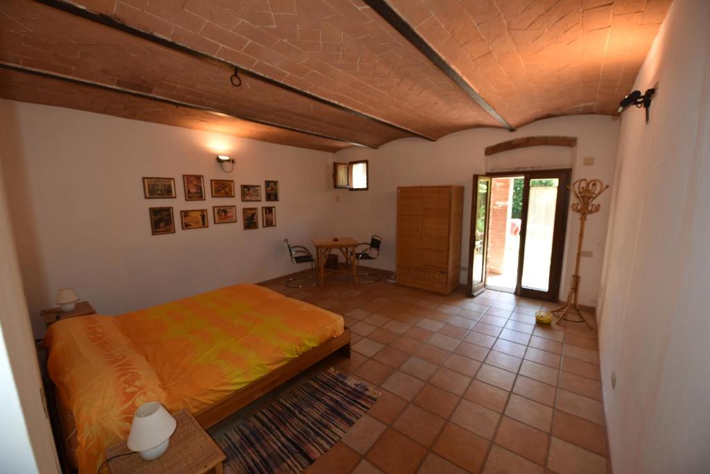 A bed or beds in a room at CASE&COLLINE La Prospettiva