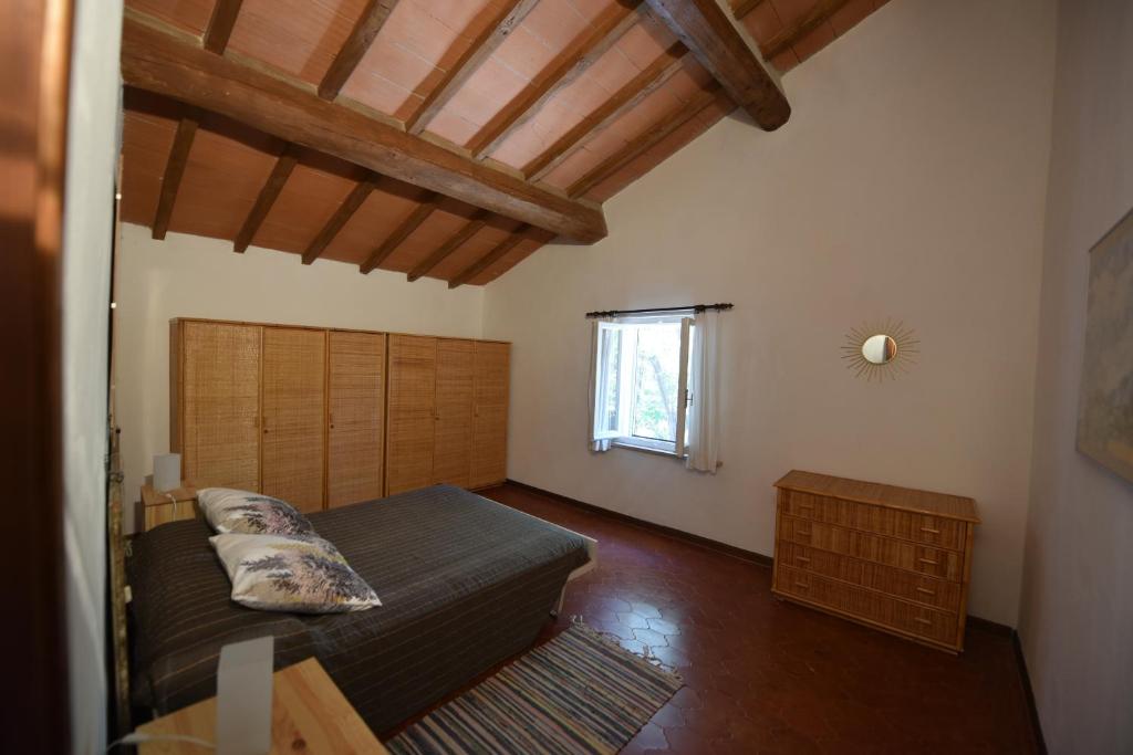A bed or beds in a room at CASE&COLLINE La Prospettiva