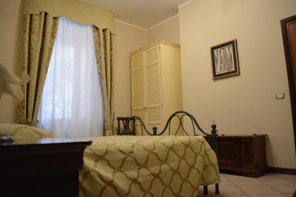 Postel nebo postele na pokoji v ubytování Ai 3 Archi