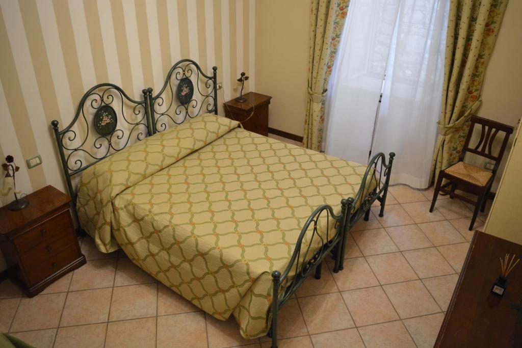 Postel nebo postele na pokoji v ubytování Ai 3 Archi