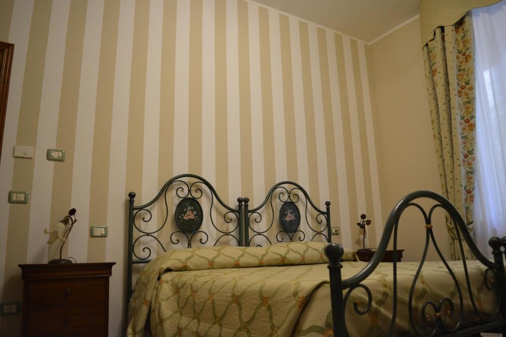 Postel nebo postele na pokoji v ubytování Ai 3 Archi